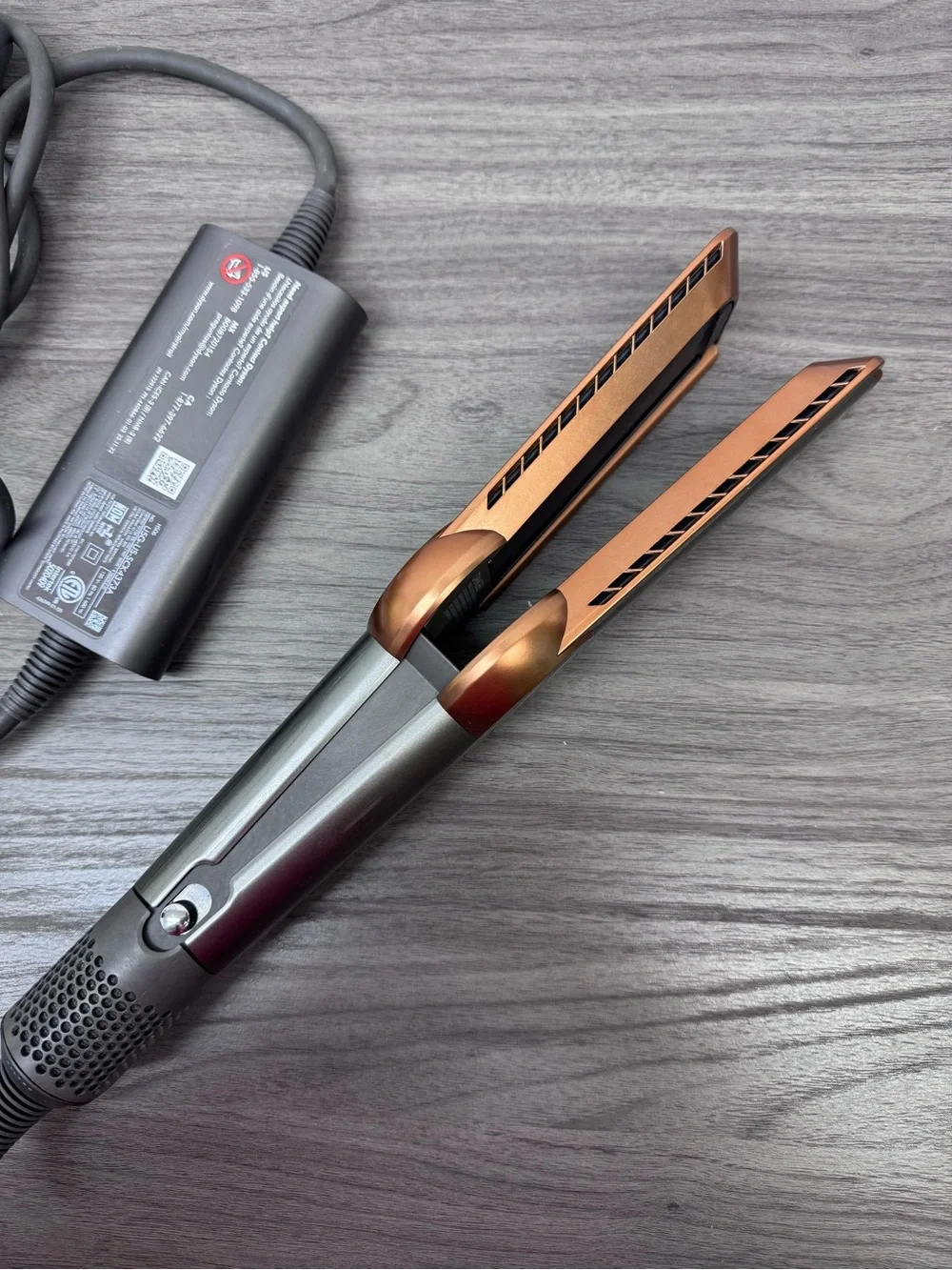 Dyson straightener in silver and copper accents